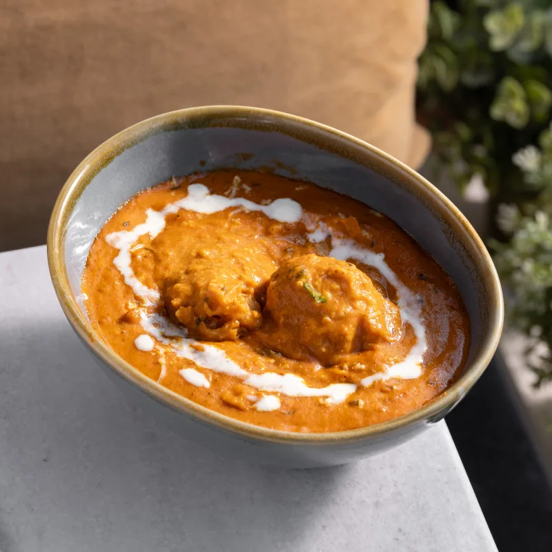 Butter Masala — Our crown jewel - velvety cashew tomato gravy, vegetarian Indian dish at Padharo Southampton