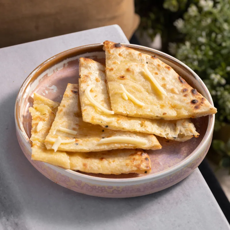 Cheesy Naan — vegetarian Indian dish at Padharo Southampton
