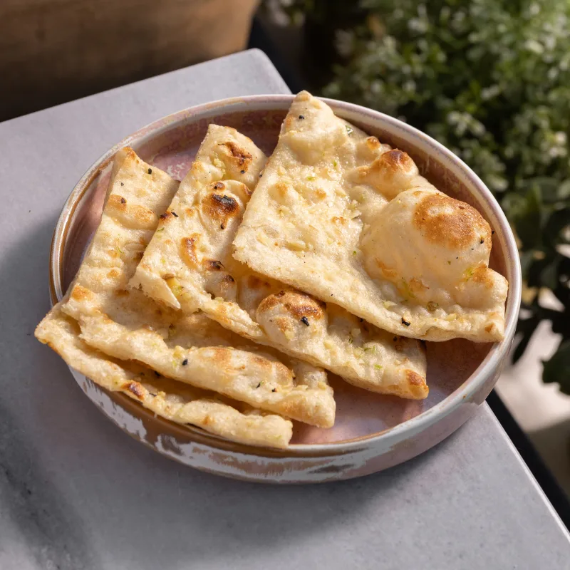 Garlic Naan — vegetarian Indian dish at Padharo Southampton