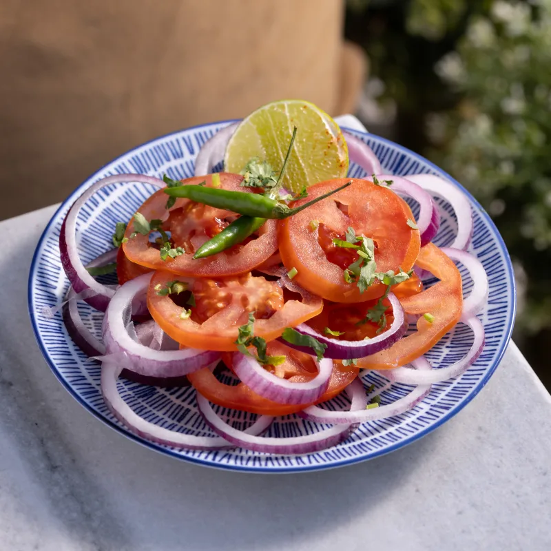 Onion & Tomato Salad — vegetarian Indian dish at Padharo Southampton
